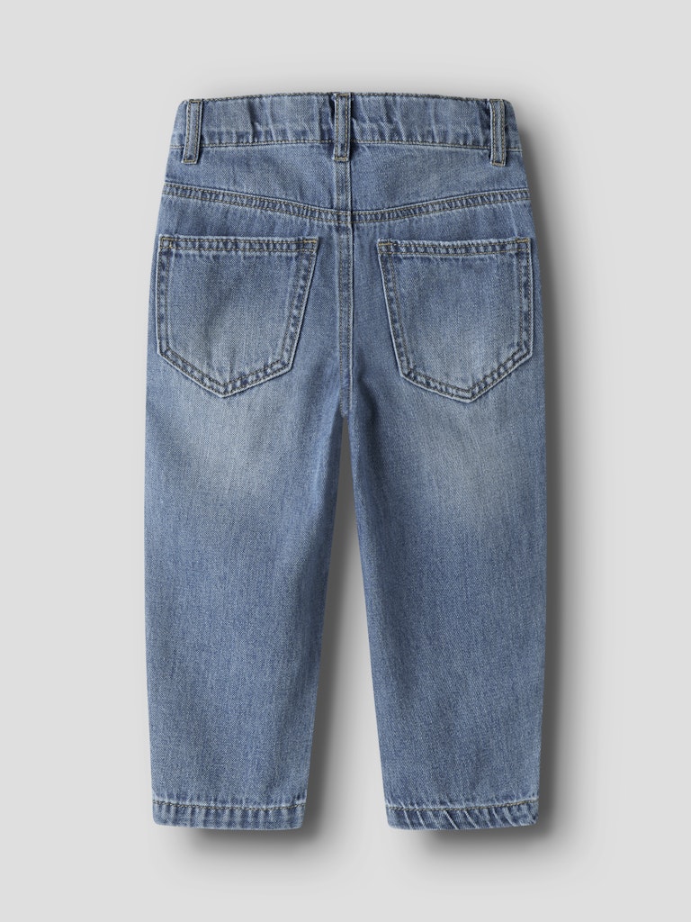 Back view of a pair of blue jeans on a light gray background