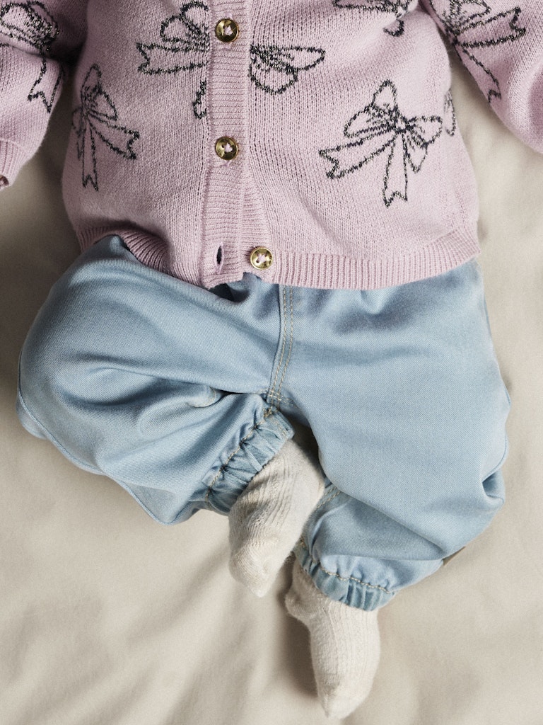 Baby wearing Rose Round Fit Light Blue Jeans