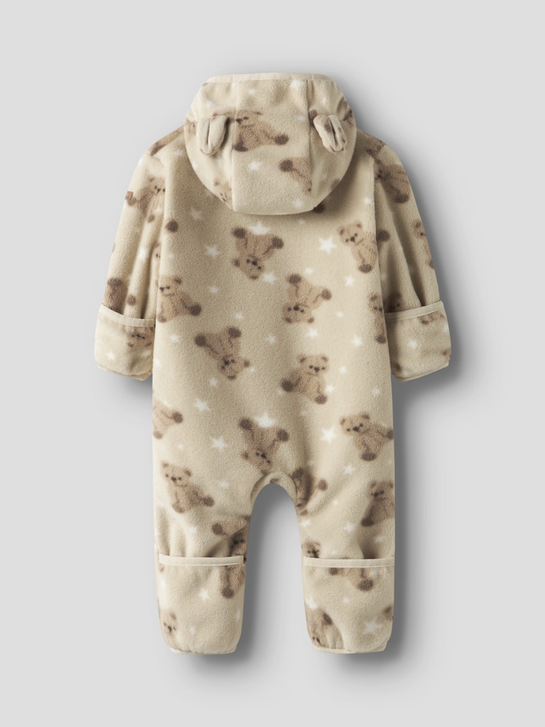 Baby onesie with teddy bear pattern on a light gray background