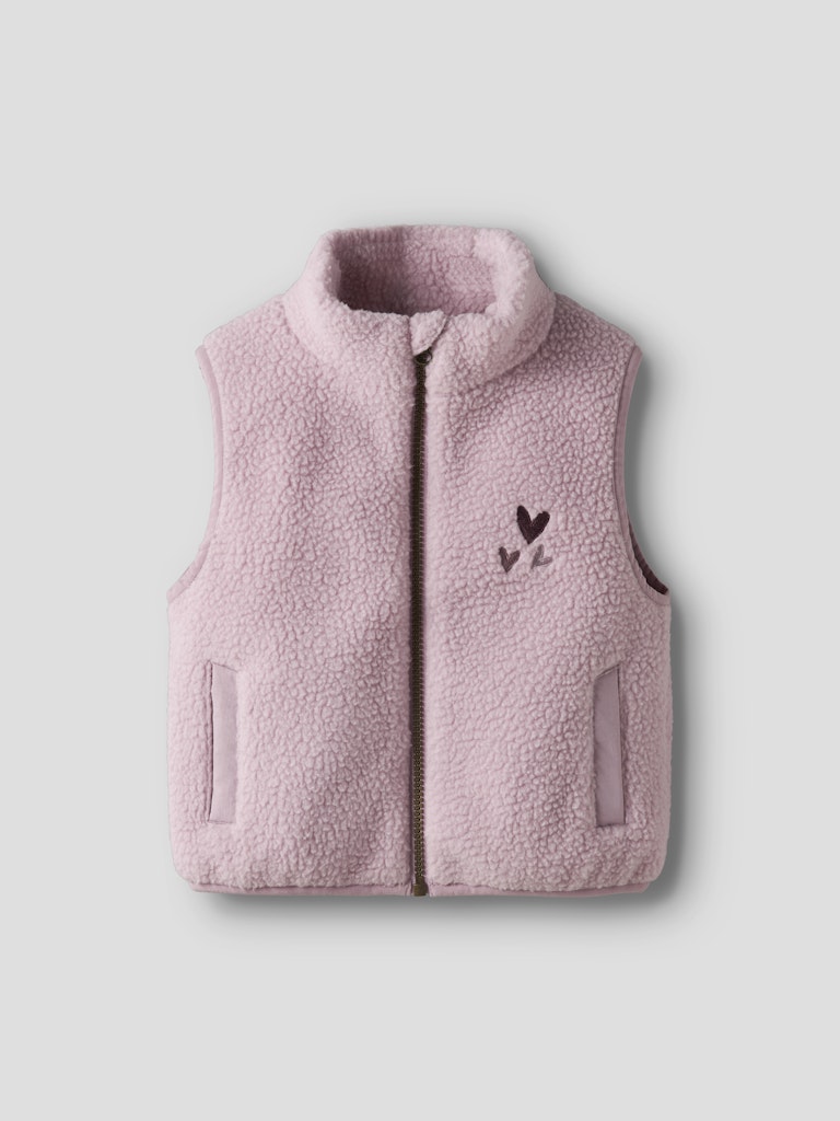 Pink fleece vest with heart design on a light gray background