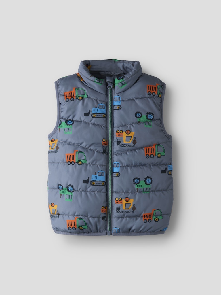 Children's puffer vest with construction vehicle pattern on a light gray background