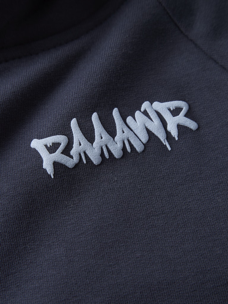 Navy hoodie with 'RAAAWR' text in white on a dark background
