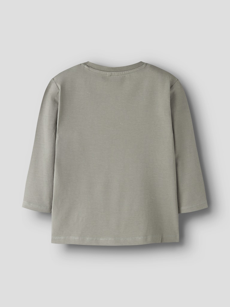 Light gray long-sleeve shirt on a light gray background