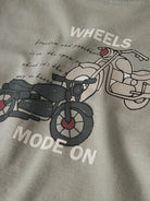 Motorcycle graphic on light grey fabric