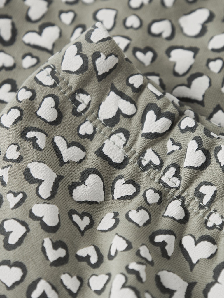 Beige fabric with grey and cream heart pattern