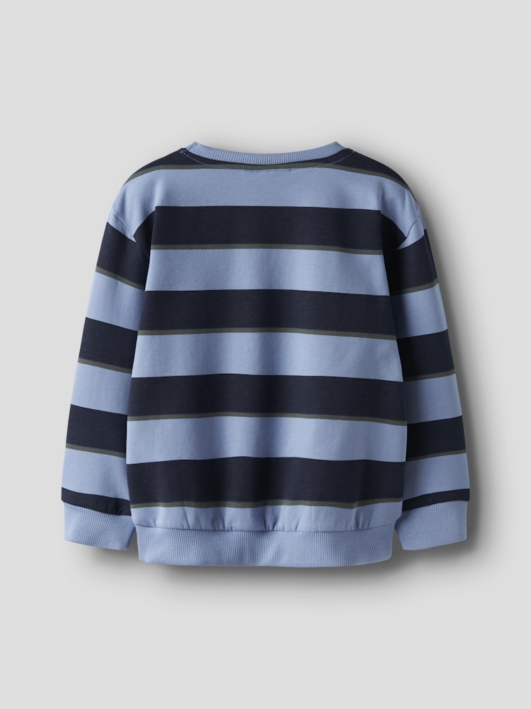 Blue and black striped sweater on a light gray background