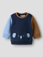 Children's sweater with bear design on a light gray background