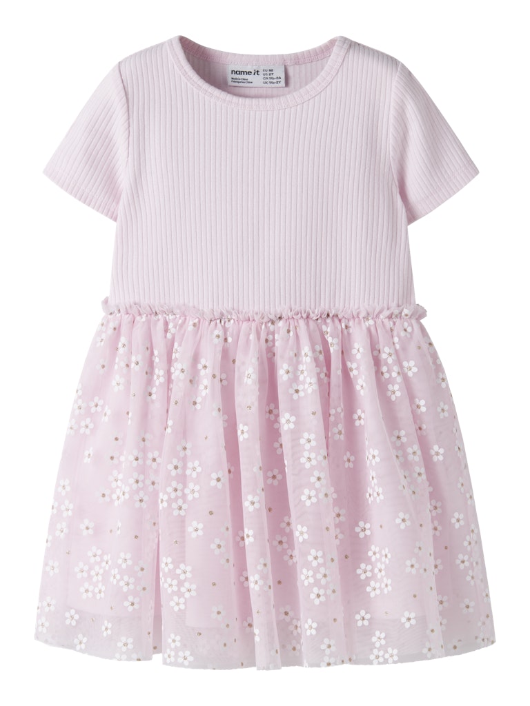 Pink dress with white floral pattern on a white background