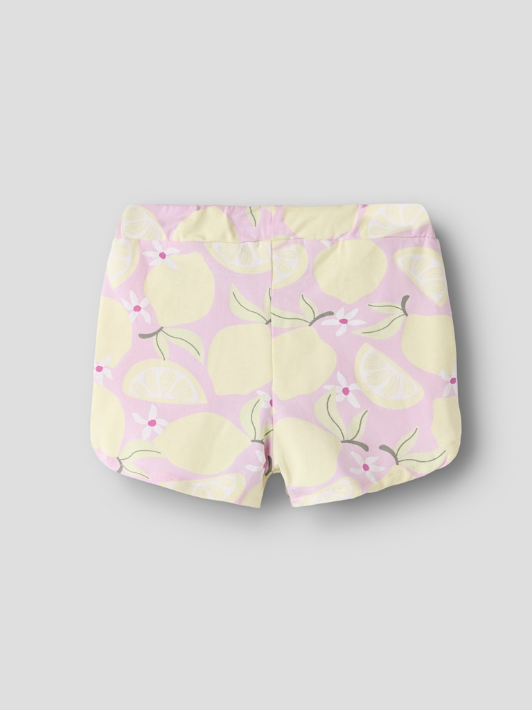 Shorts with lemon pattern on a light gray background