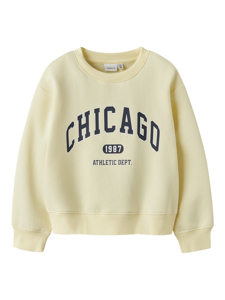 Light yellow sweatshirt with 'Chicago 1987 Athletic Dept' text on a white background