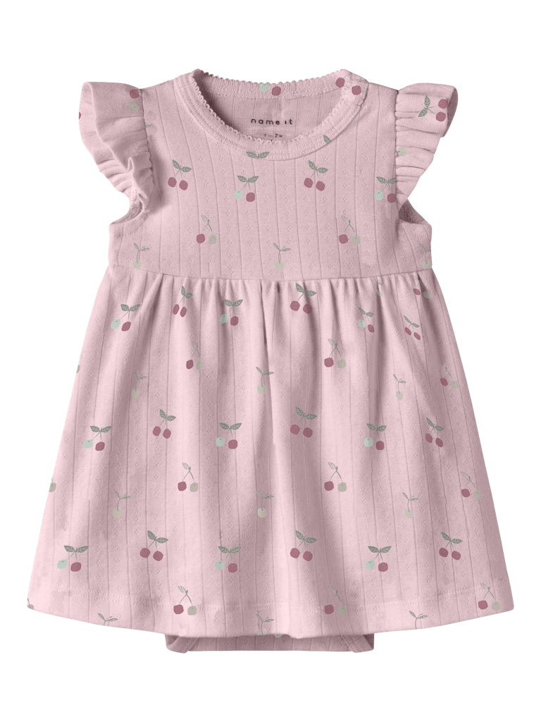 Pink baby dress with ruffled sleeves and cherry pattern on a white background