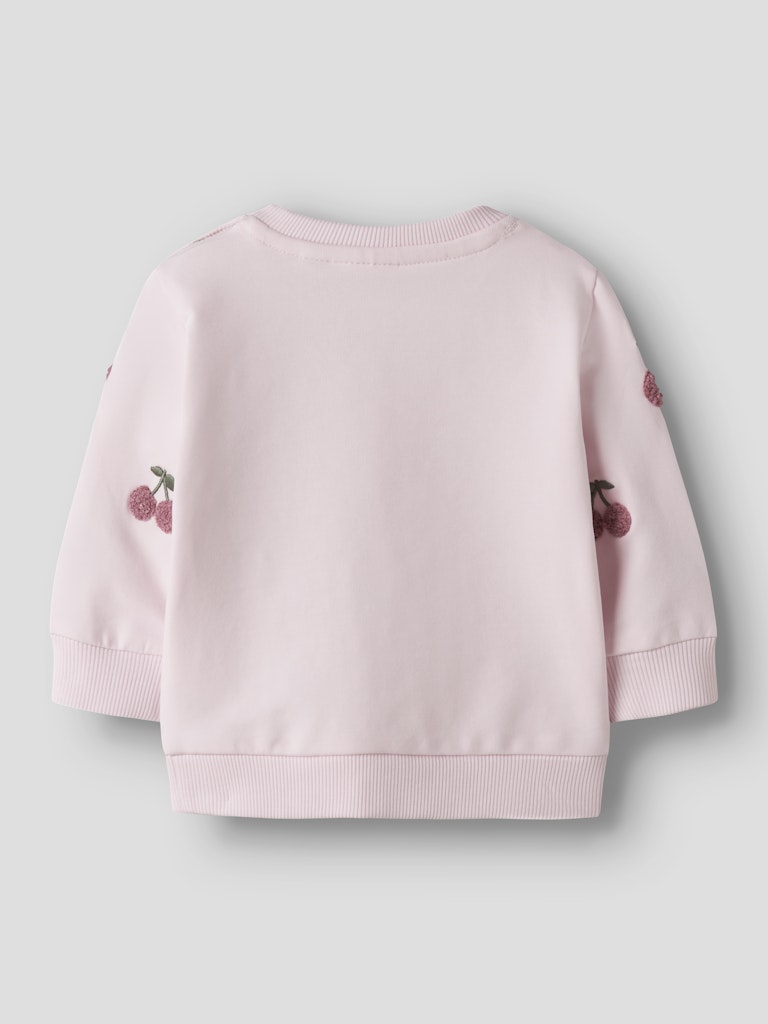 Pink children's sweatshirt with cherry designs on a light gray background