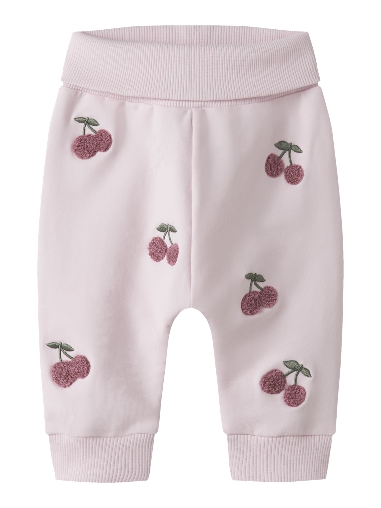 Pink baby pants with cherry embroidery on a white background