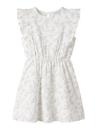White dress with subtle pattern on a white background