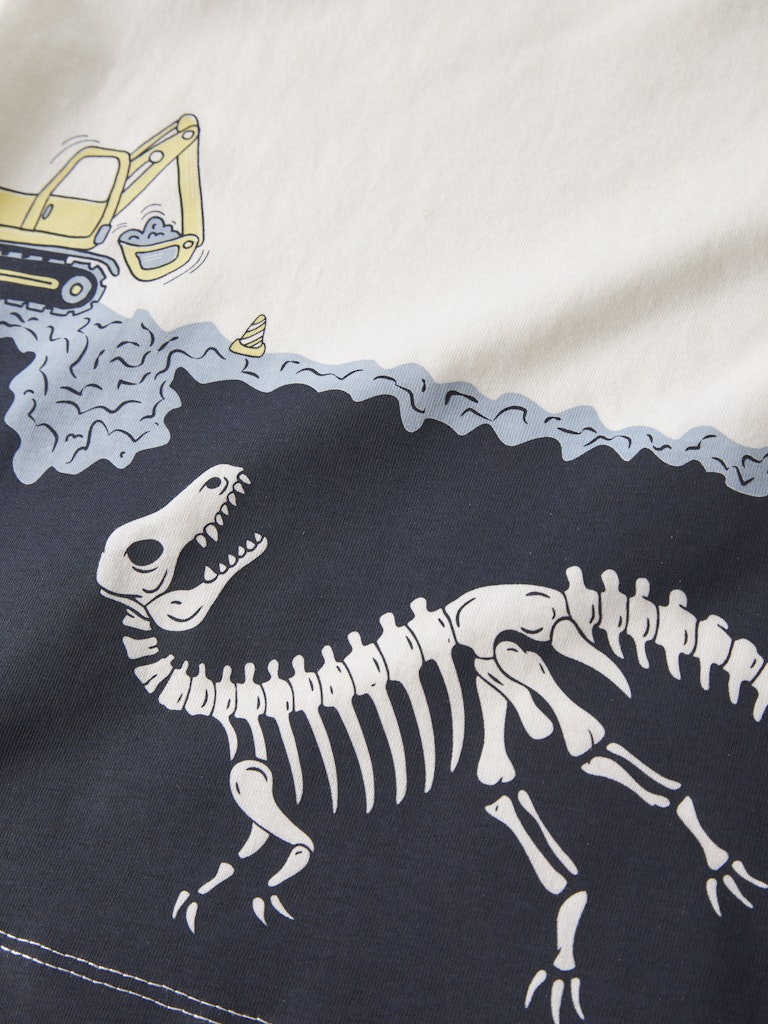 Excavator graphic with dinosaur fossil