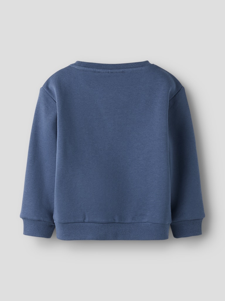 Blue sweatshirt on a light gray background