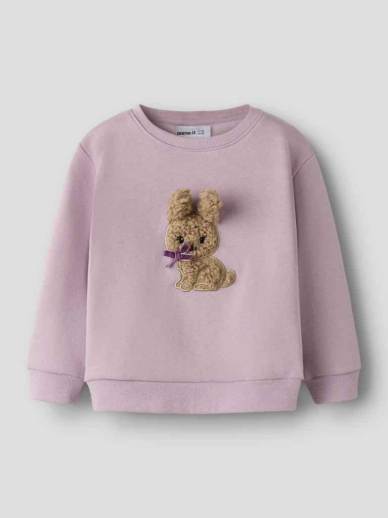 Pink sweatshirt with a teddy bear design on a light gray background