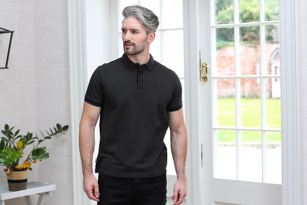 Kenrow Otto Polo in khaki worn by a model, angled view