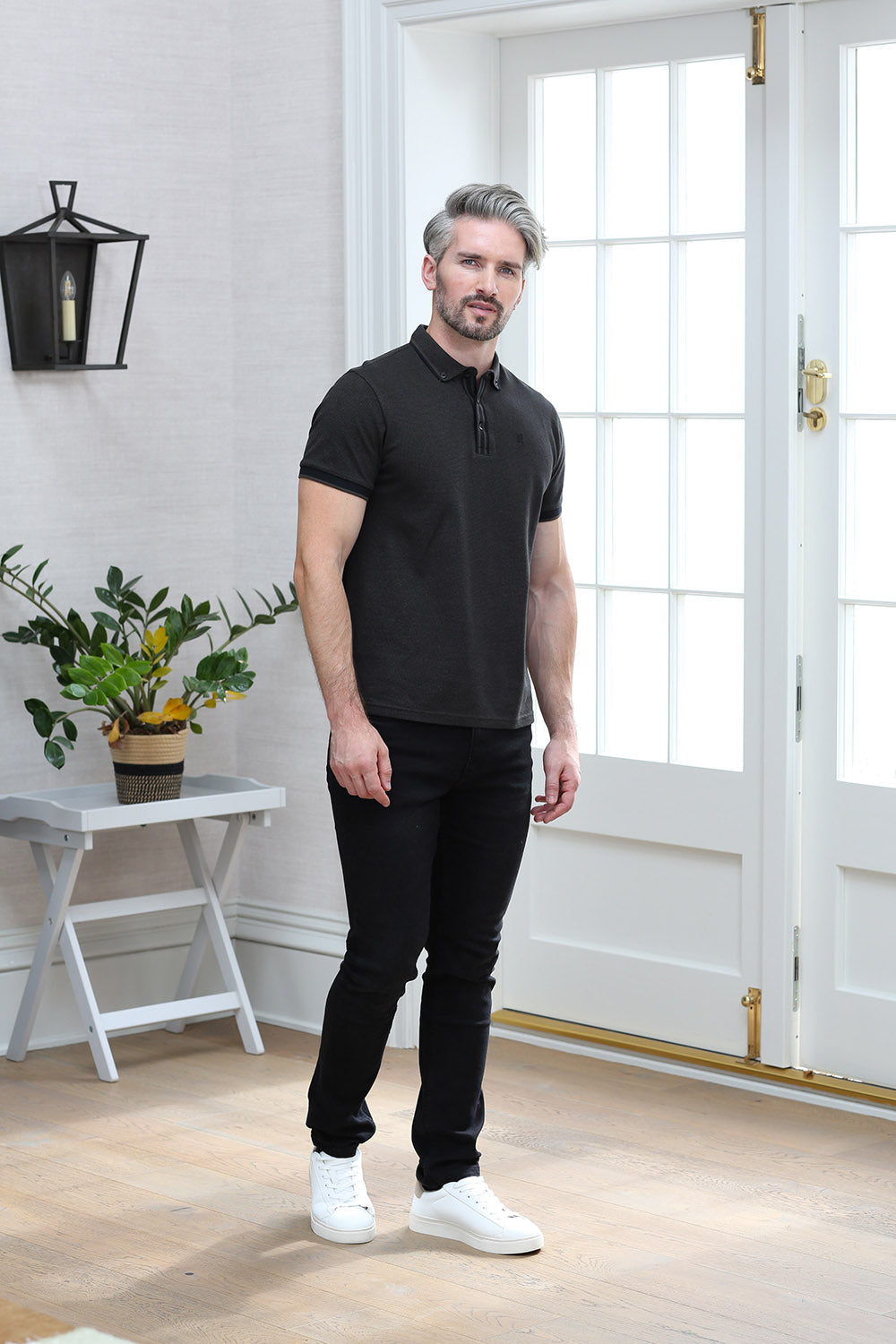 Kenrow Otto Polo in khaki worn by a model, full - length view