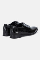 Heel view of the David black patent tuxedo shoe by Benetti