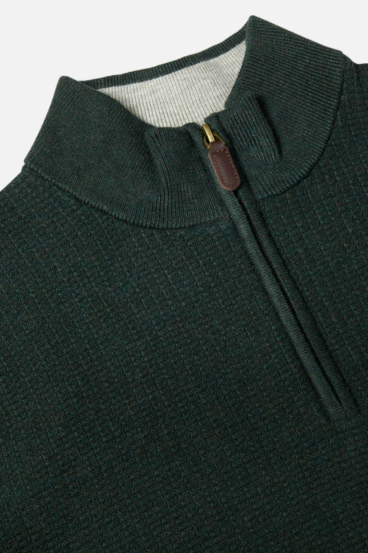 Close-up of the Benetti Oliver Forest 1/4 Zip knit, showing the ribbed collar, quarter-zip with leather pull tab, and Forest colour.