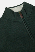 Close-up of the Benetti Oliver Forest 1/4 Zip knit, showing the ribbed collar, quarter-zip with leather pull tab, and Forest colour.