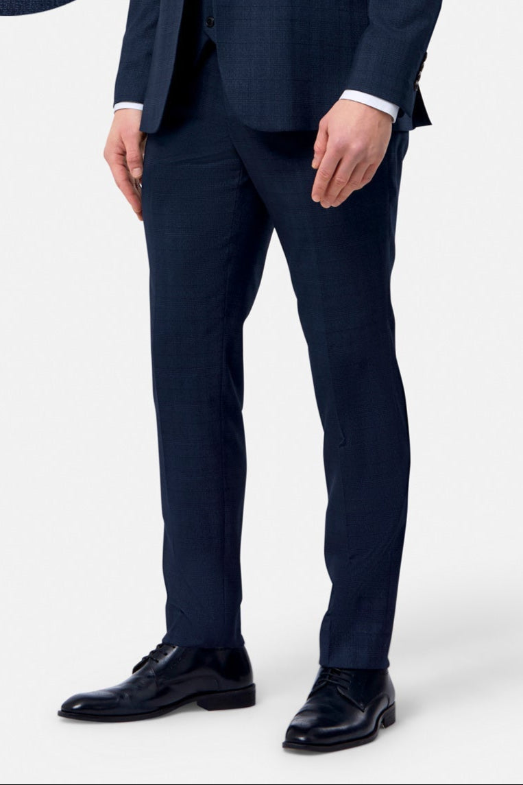 Navy blue suit with black shoes on a white background