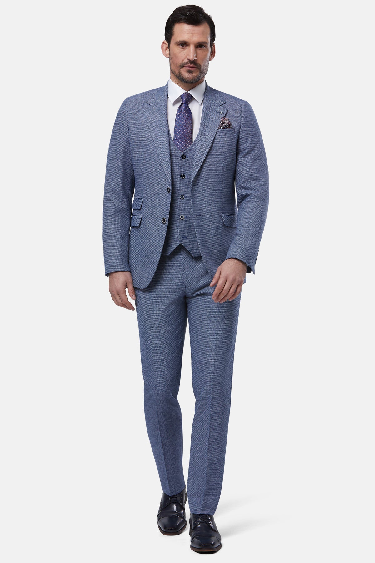 Man wearing a blue suit with a white background