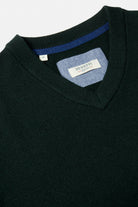 Benetti Quinn Forset V Neck Knit in FOREST, close-up of the V-neck collar and brand label.