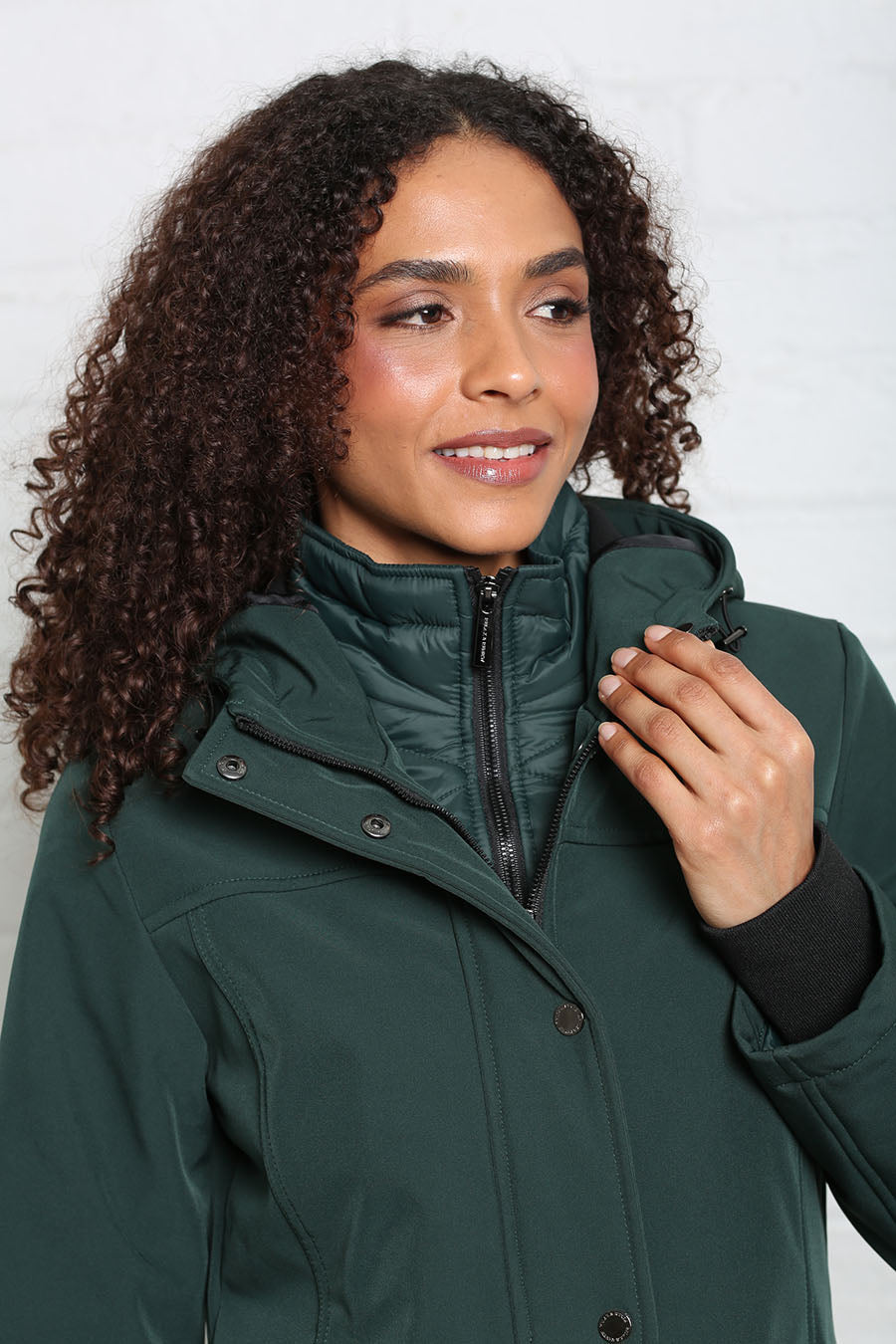 Rant & Rave Relax & Renew Elsie coat in forest, close front model view with high collar and hood.