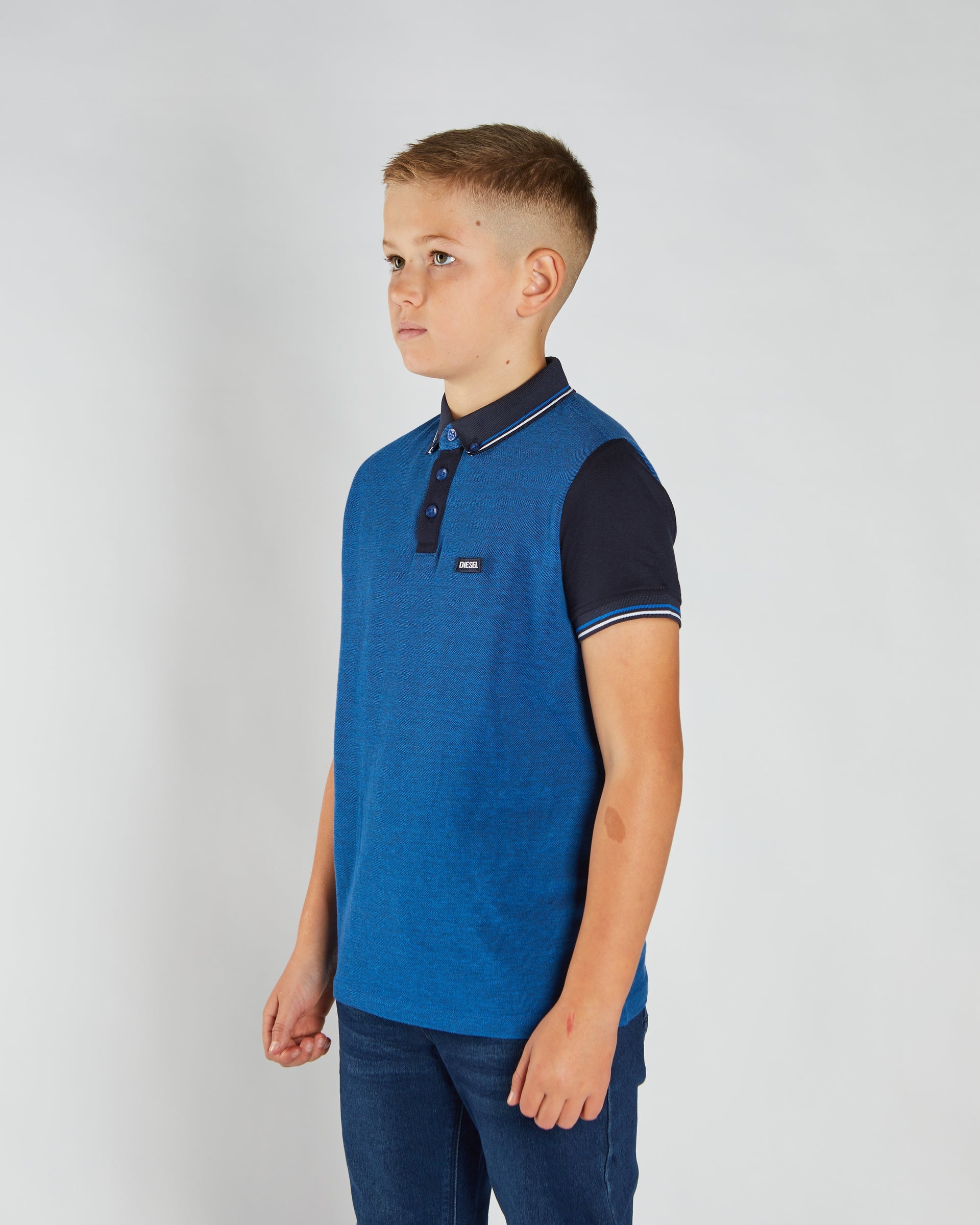 Boys Robinson Birdseye Blue/Navy Polo-Side View