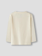 A cream-colored long-sleeve t-shirt shown from the back, photographed against a neutral light gray background.