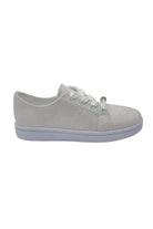 Full side view of Valerie white glitter trainer