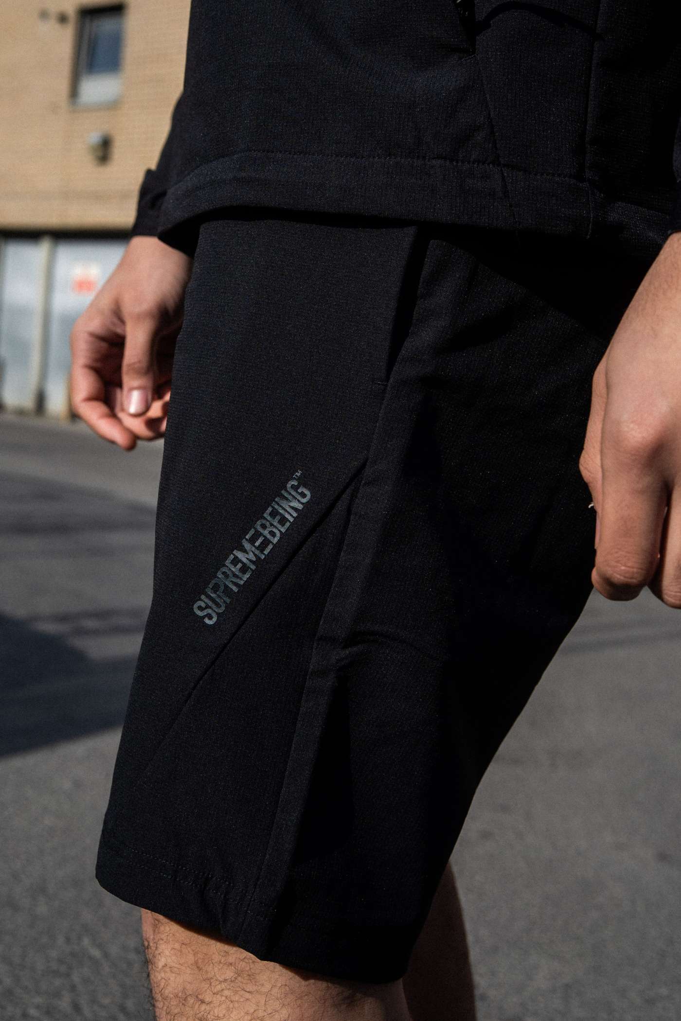 Supreme Being Tecnica Shorts Black Black model front view