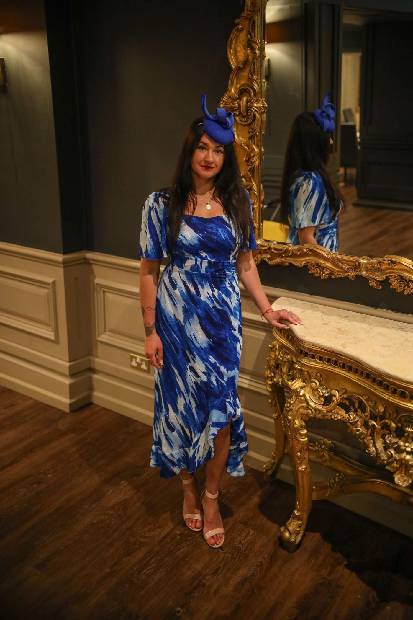 Julianna in the Heidi Blue Abstract Burnout Ruched Midi Dress