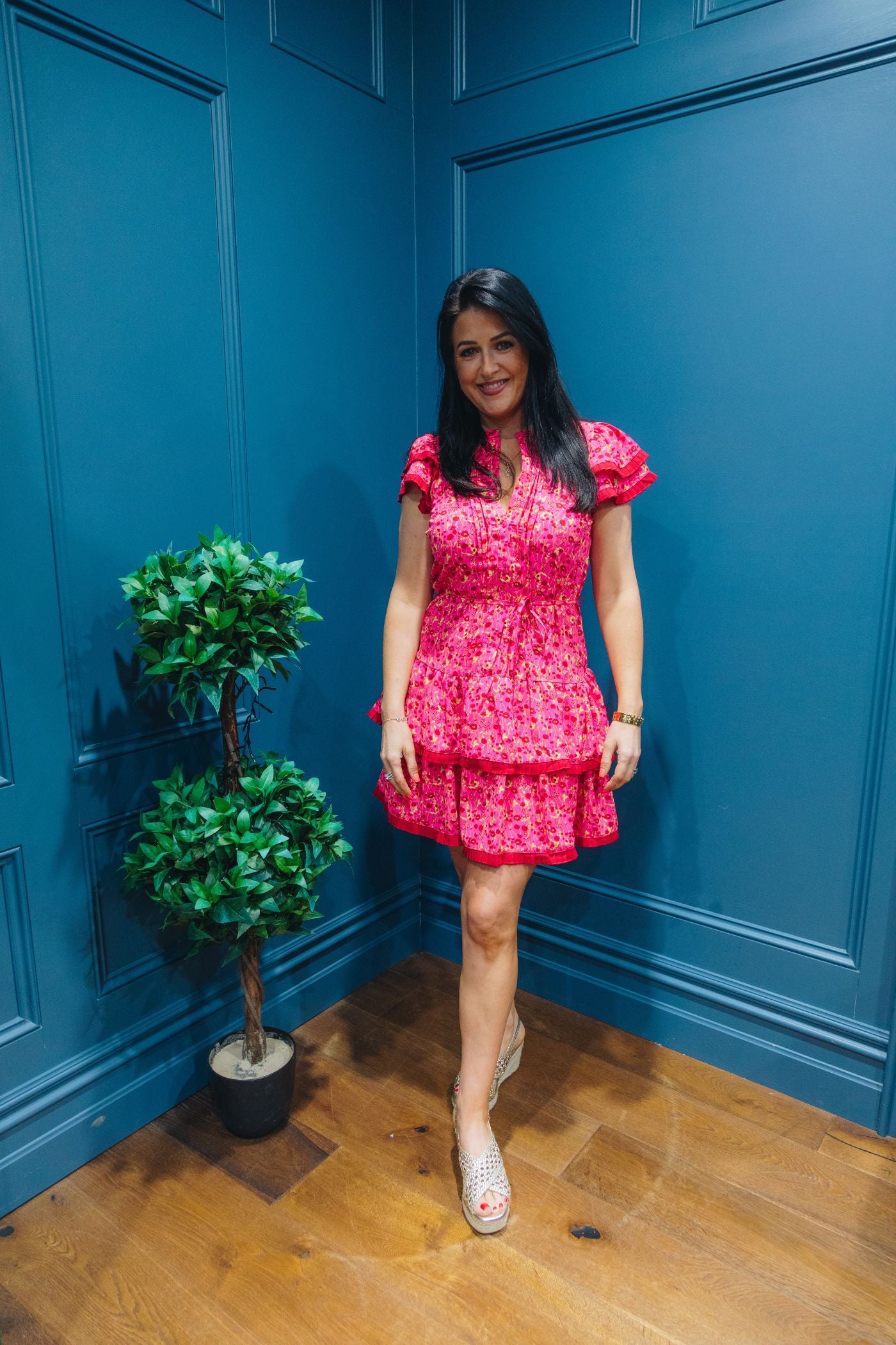 Tina in the Eliana Mini Pink Dress