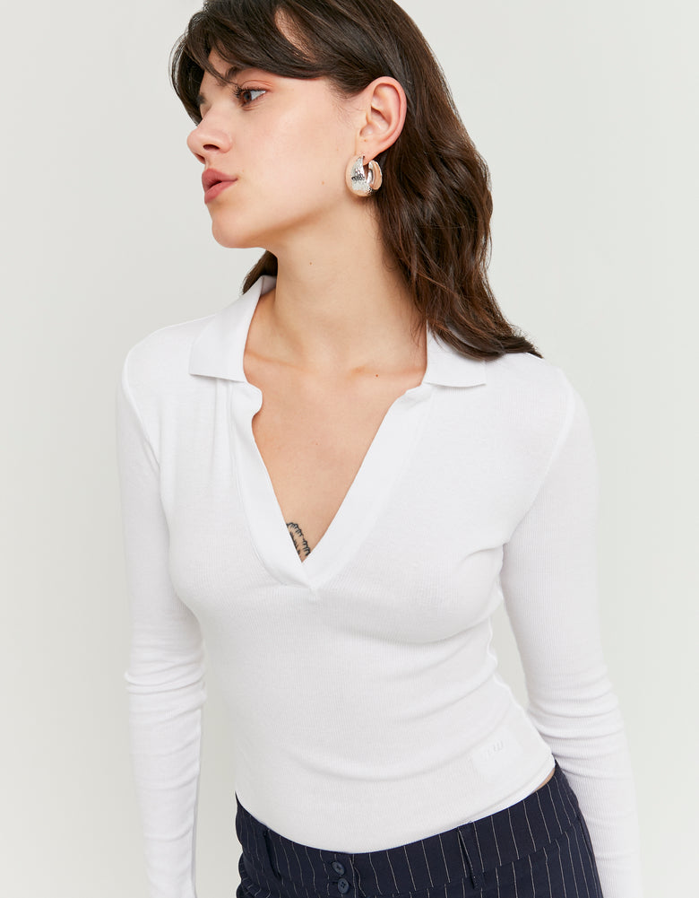 Close-up top view of white V neck bodysuit
