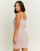 Model back view of pink bodycon mini dress