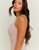 Side view of pink bodycon mini dress