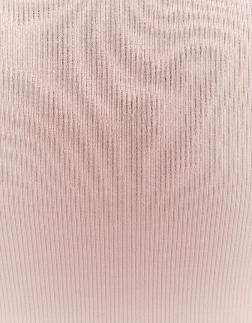 Detail view of pink bodycon mini dress