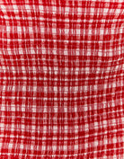 Pattern detail on Vichy print mini dress