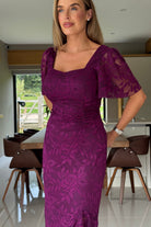 Close-up of lace detail on Heidi plum midi dress