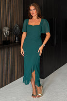 Girl In Mind Heidi green ruched midi dress front model view