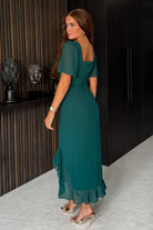 Girl In Mind Heidi green ruched midi dress back model view