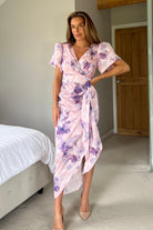 Front view of Drew purple marble midi dress with puff sleeves