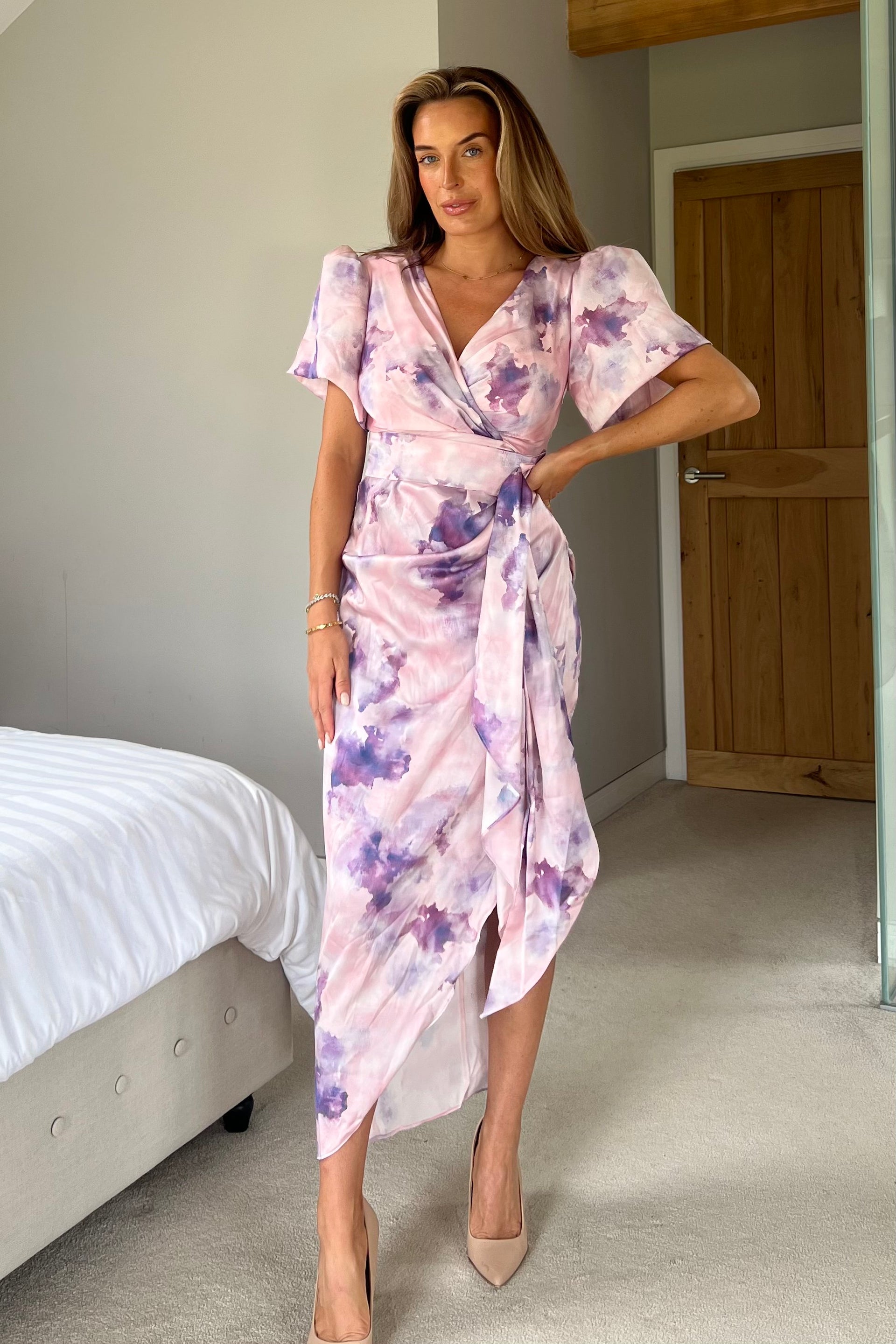 Front view of Drew purple marble midi dress with puff sleeves