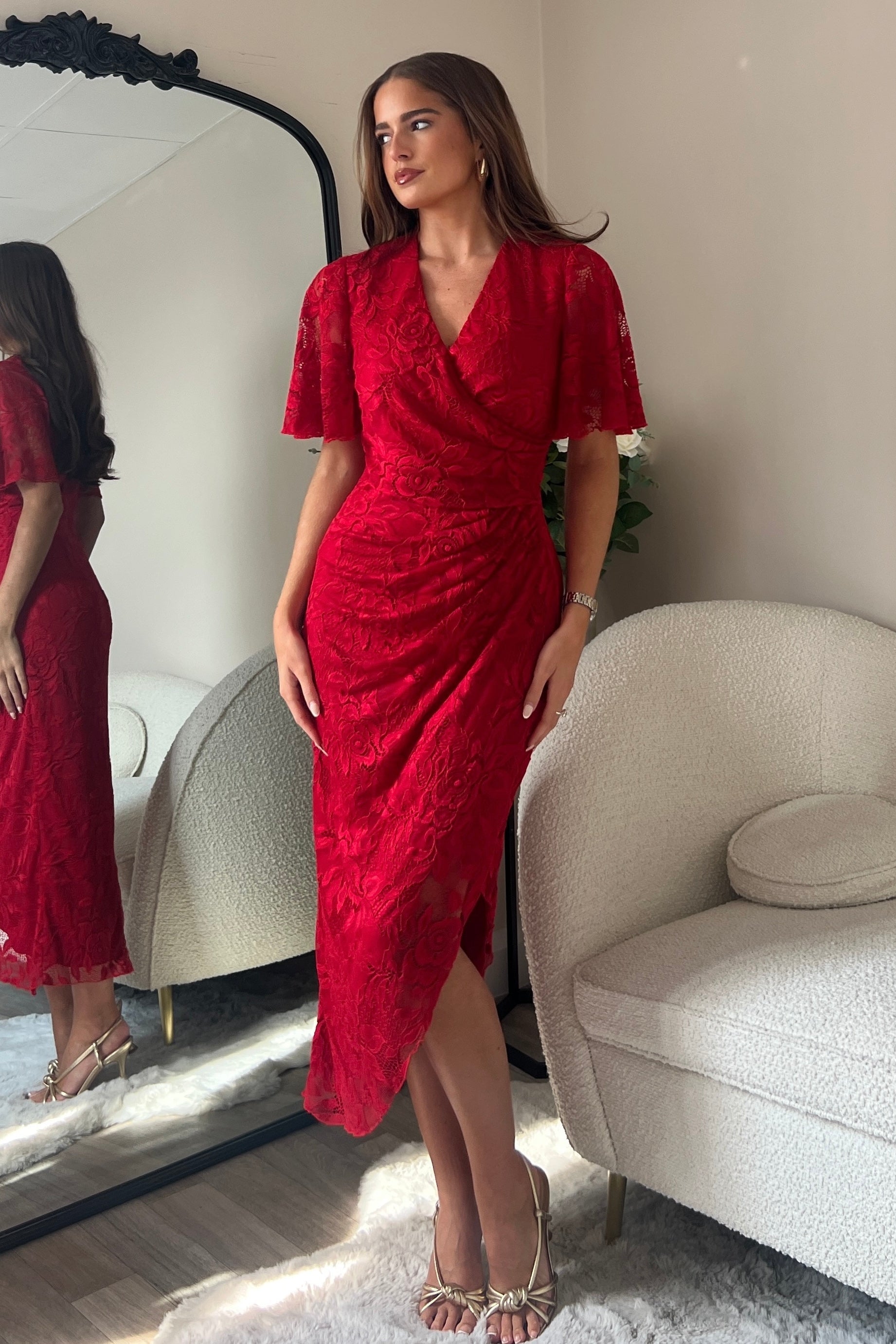 Front angle of Natasha red lace wrap-style midi dress