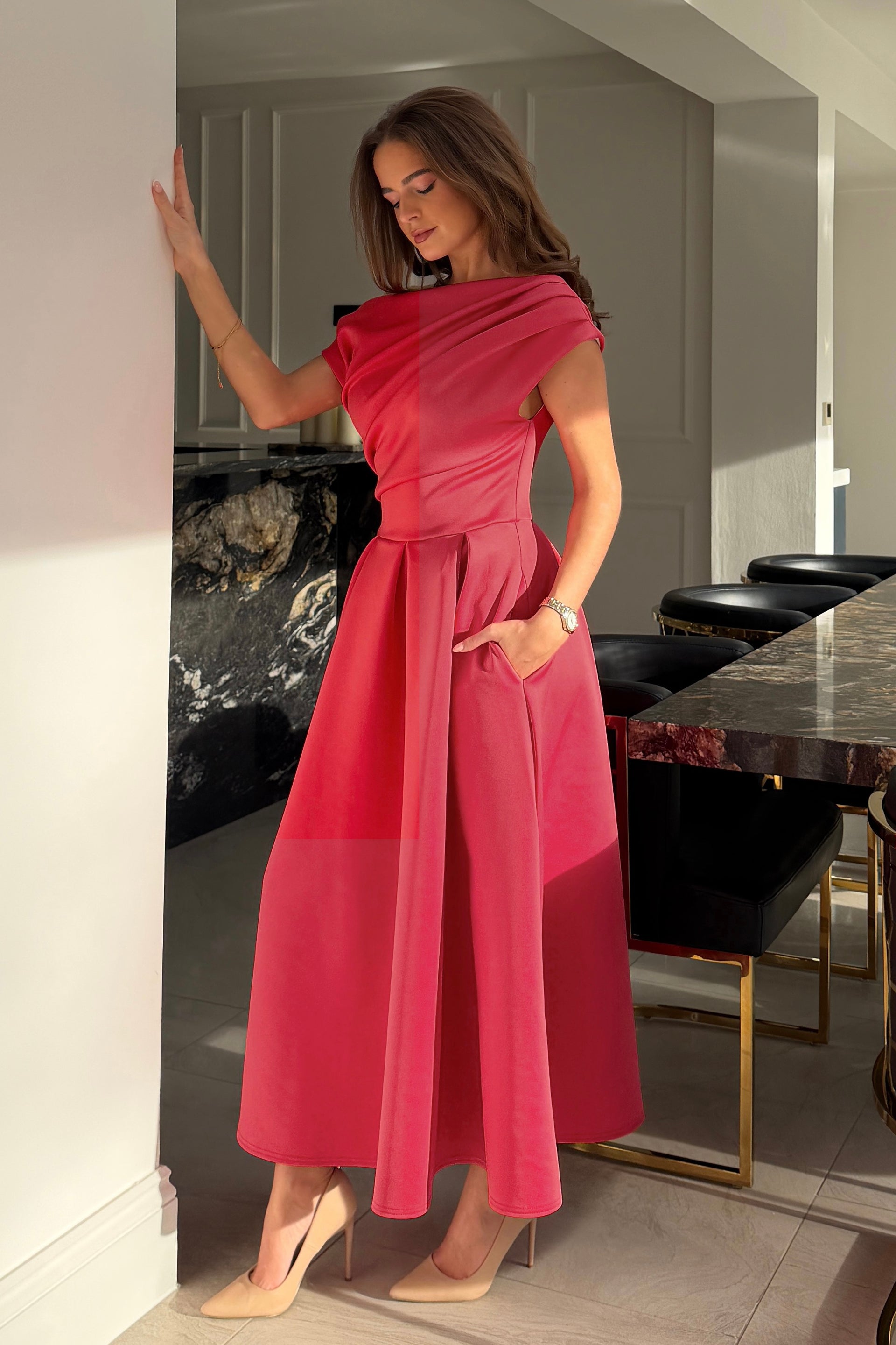 Ladies Betty Asymmetric Coral Midi Dress-Showing the dress has pockets