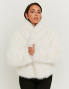 Front model view of the white faux fur jacket closed