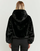 Back view of black faux fur jacket